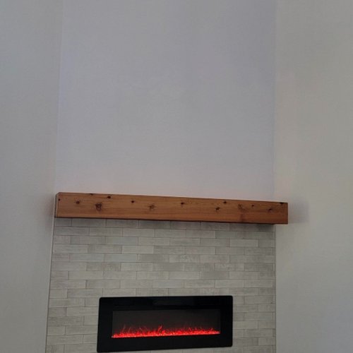 Modern fireplace remodel by Tukasa Creations