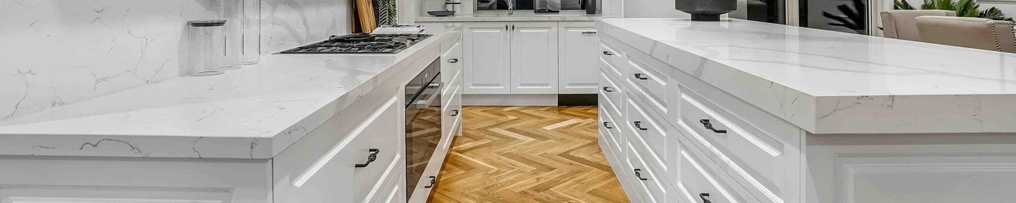 Bright kitchen renovation with hardwood flooring